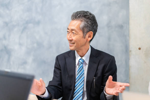 istock A manager in a suit expressing his opinion 1355809670