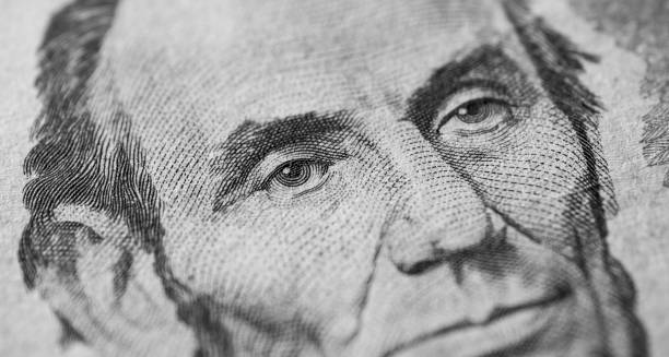 istock Close up of U.S. Dollar Currency 1355814780