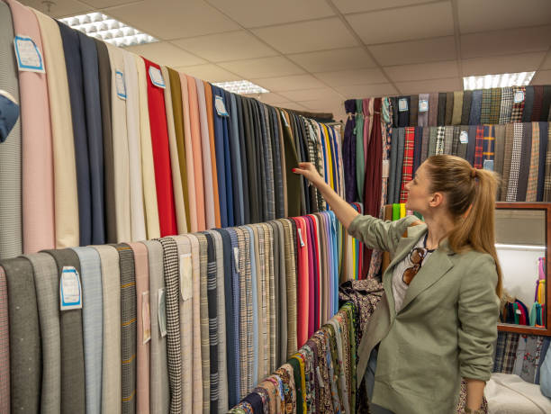 istock A large store of various fabrics and accessories for tailoring. 1355815565
