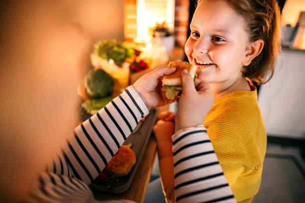 istock Happy family in the kitchen. 1355815862