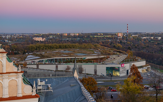 Lublin, Poland - October 30, 2021: A picture of the VIVO! Lublin Shopping Center at sunset.