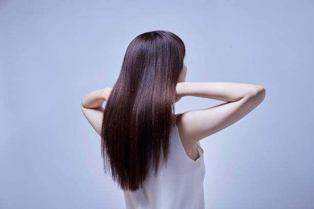 haarbild junger japanischer frauen - women long hair rear view beauty stock-fotos und bilder