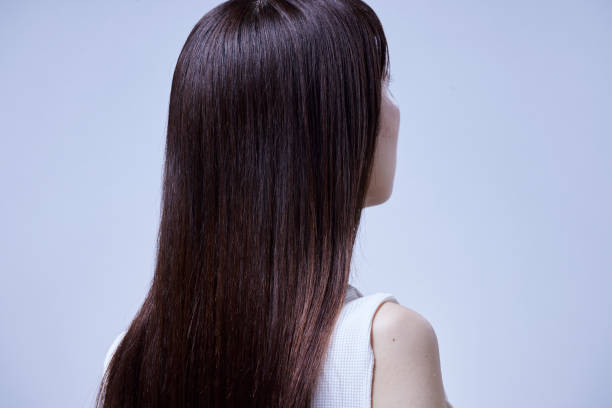 haarbild junger japanischer frauen - women long hair rear view beauty stock-fotos und bilder