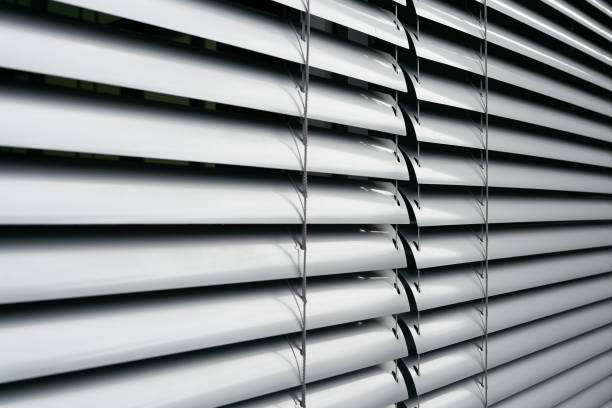 Blinds on the window of an office building in Berlin stock photo