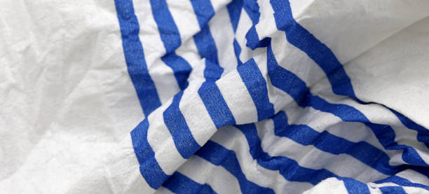 istock blue and white crumpled paper napkin background 1355820481