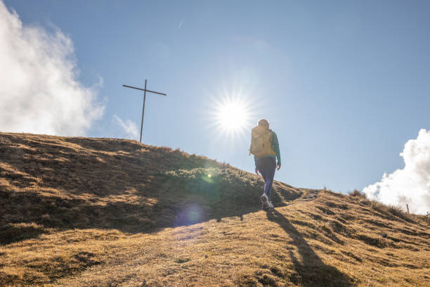 istock Young woman hiking in Switzerland 1355820543