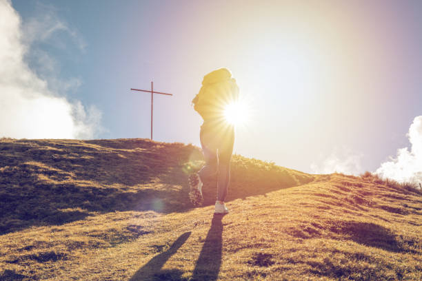 Young woman hiking in Switzerland\nPeople travel and enjoying outdoors activity concept.