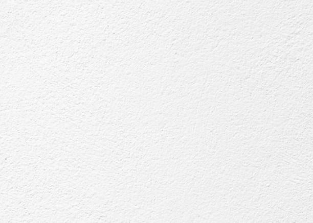 istock White color wall background cement paper texture. Wallpaper surface for design art work and interior or exterior. High quality abstract pattern can be used as winter season Christmas card backdrop 1355828772
