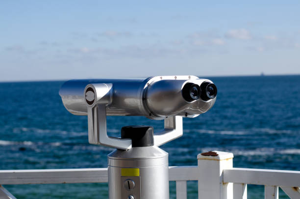 istock Observation binoculars. Observation deck by the sea. Walk by the sea. 1355830856