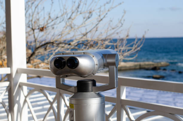 istock Observation binoculars. Observation deck by the sea. Walk by the sea. 1355830885