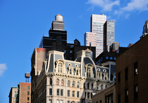 The former Grand Hotel NYC (1868) with its mansard roof, seen from Broadway, Manhattan, New York, USA