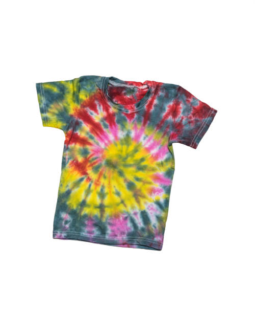 istock Tie dye-style short-sleeved T-shirt isolated on a white background. Flat lay. 1355834934