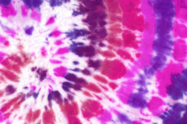 Tie dye spiral shibori colorful abstract background Tie dye spiral shibori hand painted colorful ornamental elements on white background. Abstract texture. Print for textile, fabric, wallpape dye stock illustrations