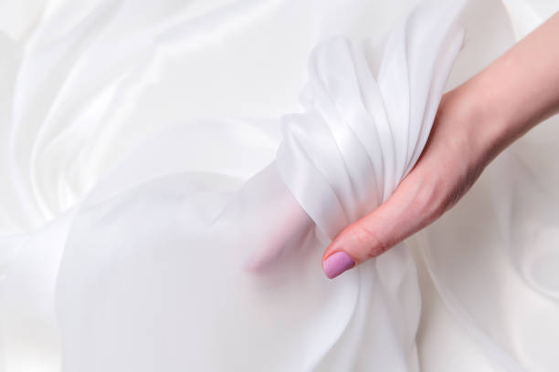istock Silk fabric, matte organza, milk color. 1355838260
