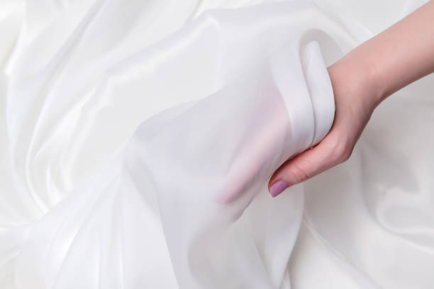 istock Silk fabric, matte organza, milk color. 1355838292
