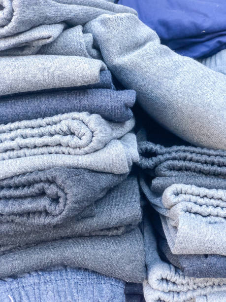 istock stack of folded cotton combed trousers in the store 1355839004