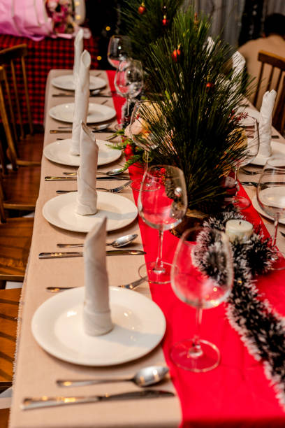 istock Christmas party table decorations fine dining wine glasses 1355841486