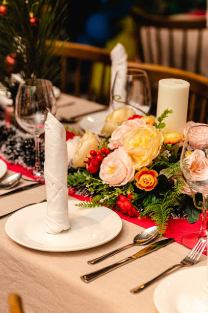 istock Christmas party table decorations fine dining wine glasses 1355841544