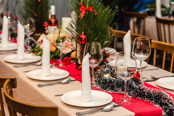 istock Christmas party table decorations fine dining wine glasses 1355841747