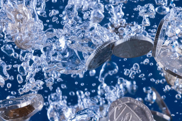 концепция отмывания денег - twenty pence coin стоковые фото и изображения