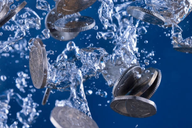 концепция отмывания денег - twenty pence coin стоковые фото и изображения