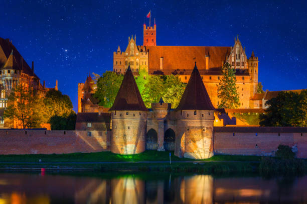 Malbork Castle of the Teutonic Order at night, Poland Malbork, Poland - September 18, 2019: Malbork Castle of the Teutonic Order at night, Poland malbork photos stock pictures, royalty-free photos & images