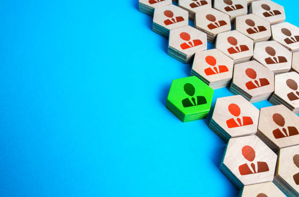 istock The green man is breaking the company structure. Breakthrough idea. Innovation, fresh look. Breaking new ground. Destroy the system, reformat into a new paradigm. New leader. Strong influence. 1355846900
