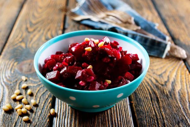 istock Vinegret is a salad in Ukrainian cuisine. It includes diced cooked vegetables (beetroots, potatoes, carrots), chopped onions and brined pickles 1355848219