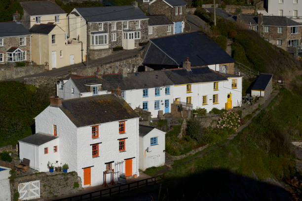 Portloe, Cornwall, United Kingdom - November 21, 2021: Traditional cottages in the small fishing village of Portloe on the coast of Cornwall.