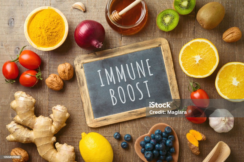 Fruits and vegetables for immune system boosting. Healthy eating background with copy space. Top view Immune System Stock Photo