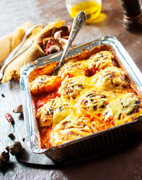 istock Hot meatballs baked with cheese and vegetables. 1355849399
