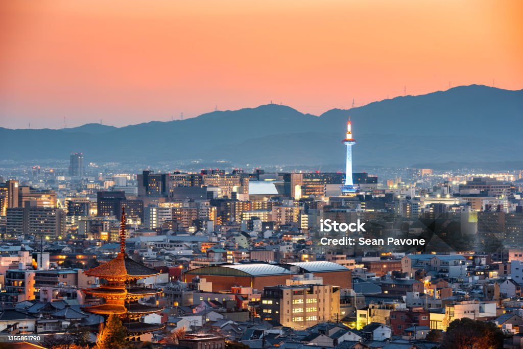 Kyoto, Japan Skyline at Dusk Kyoto, Japan skyline and towers at dusk. Kyoto City Stock Photo