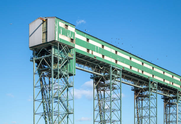 istock Grain elevator for grains, oil seeds and pulses at a port facility. 1355856827