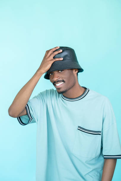istock stylish rapper man urban style model shooting 1355857766