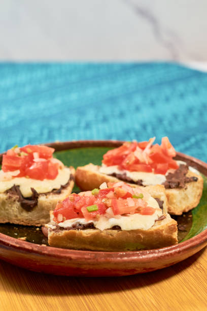 istock Authentic homemade Mexican molleteson your plate. 1355858797