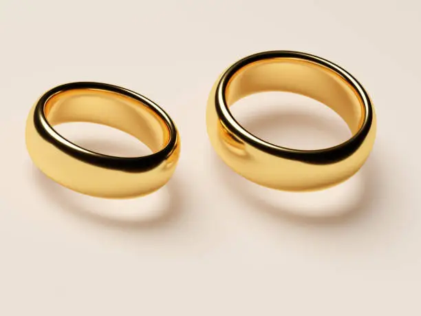 Two wedding gold rings fly. Love concept. 3d rendering