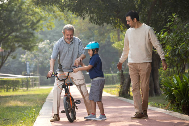 istock Multi-generation family enjoy at park 1355869910