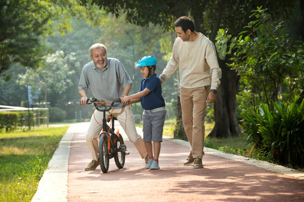 istock Multi-generation family enjoy at park 1355870425