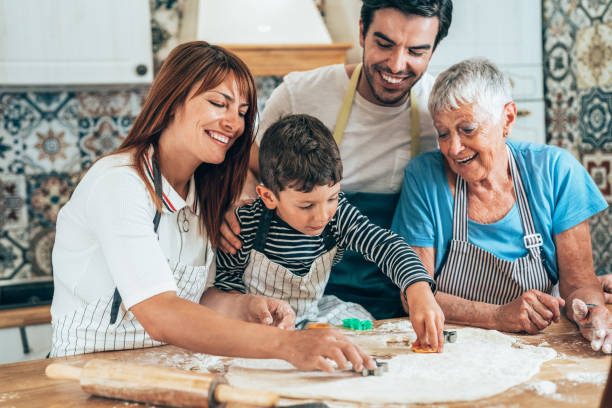 istock Family cooking 1355872390
