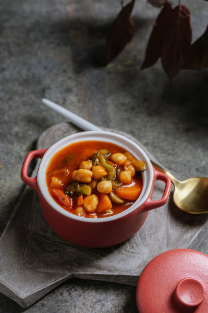istock Vegan food, chickpeas stewed with vegetables 1355872677