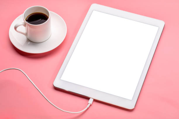 istock digital tablet with blank screen on a pink background 1355872751