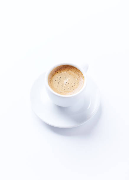 istock Cup of coffee on bright paper background. Copy space. 1355874574