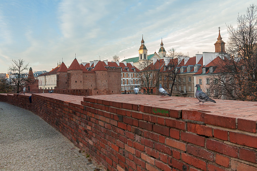 Old Town of Warsaw, Poland. Barbican surrounding the Old Town. Pigeons on the wall. Morning in the city. The capital of Poland. Travels around Europe.