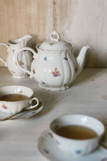 istock Breakfast tea served with fine china porcelain set with roses 1355874645