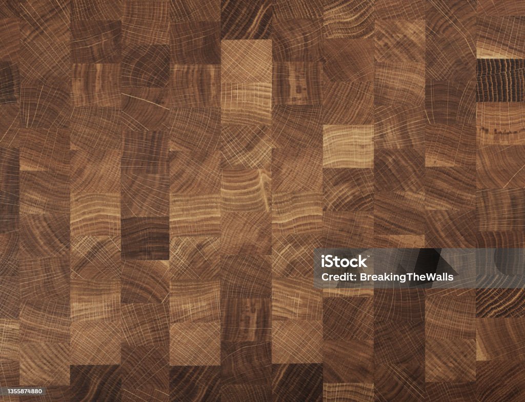 Wooded butcher end grain chopping block Brown oak wooden butcher chopping block, natural durable end grain hard wood cutting board texture background pattern, close up Butcher's Shop Stock Photo