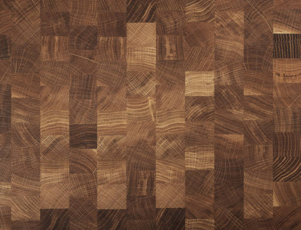 Wooded butcher end grain chopping block Brown oak wooden butcher chopping block, natural durable end grain hard wood cutting board texture background pattern, close up block shape stock pictures, royalty-free photos & images