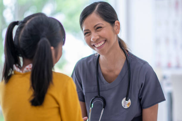 istock Little Girl at the Doctors 1355894977