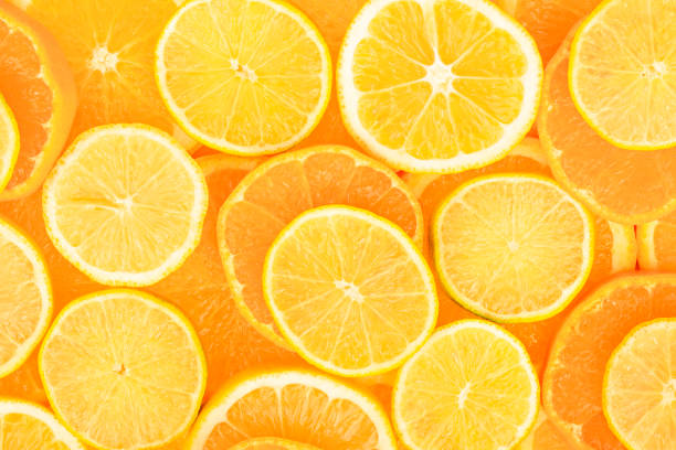 istock background of oranges, tangerines and lemon 1355897728
