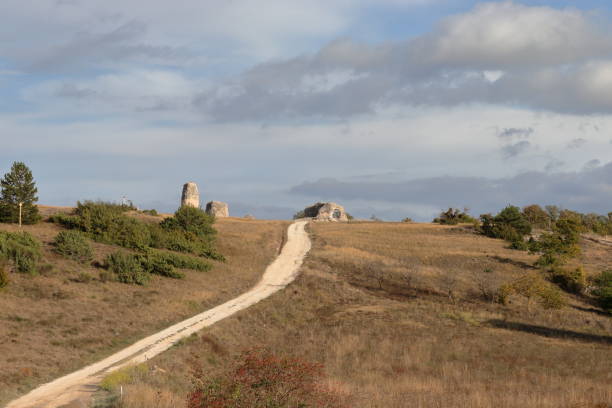 The country road that climbs towards the ruins is the route of the ancient Tratturo Magno, the longest of the Royal drovers' tracks which began in L'Aquila (Abruzzo) and ended in Foggia (Puglia) on which transhumance took place for centuries. The ruins are the walls and towers of the ancient town of Peltuinum (1st century BC), an archaeological site that can be visited freely.