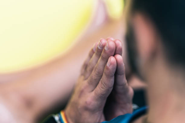 istock Selective focus on the hands of a man with a rainbow bracelet 1355903147